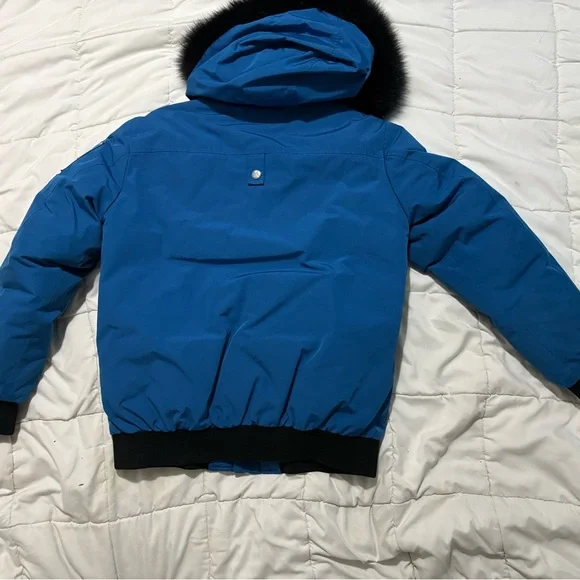 Children’s XL moose knuckle bomber jacket in blue.